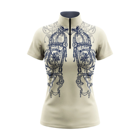 Studio white‑background product mockup of women’s cream navy ornate bridle tack symmetrical print short‑sleeve quarter‑zip riding top with contrast navy collar