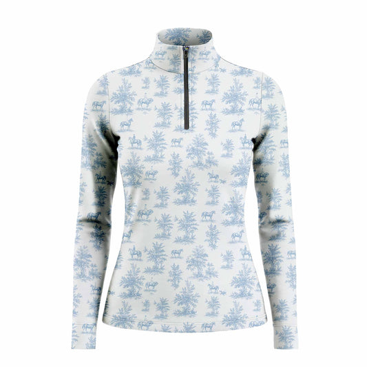 White background studio product shot showcasing full soft blue pastoral horse rider toile ditsy print on off-white long sleeve quarter-zip riding top