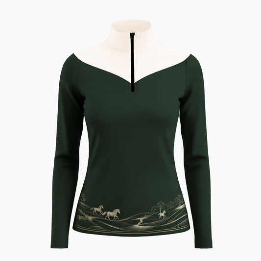 White background studio shot of color-block riding top with white V shoulder panels, forest green fabric and golden pasture horse landscape hem print
