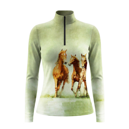 Studio shot of the RIDER ATELIER Sage Green Watercolor Galloping Horses Print Long-Sleeve Quarter-Zip Riding Top, showing the full watercolor print, sage green gradient base, quarter-zip collar, and fabric texture against a clean white background