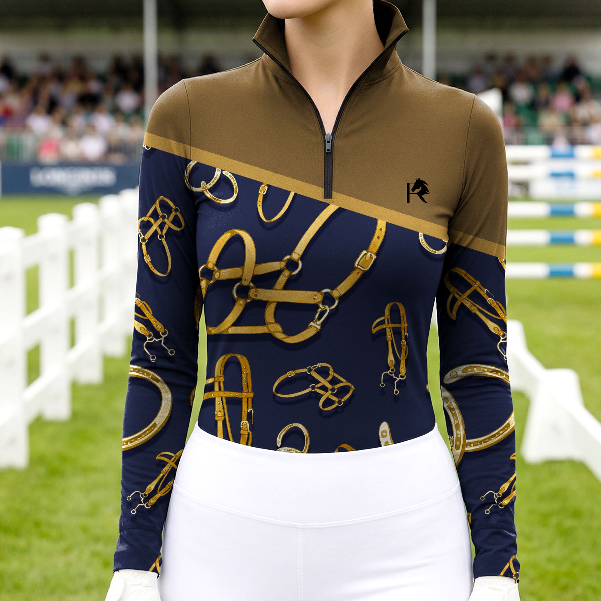 Woman wearing RIDER ATELIER Equestrian Tack Colorblock Quarter-Zip Top at an equestrian show arena, paired with white breeches and riding gloves