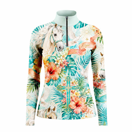 White background studio shot of pale turquoise tropical hope ribbon white stallion hibiscus dove floral cross allover print long sleeve quarter zip riding top