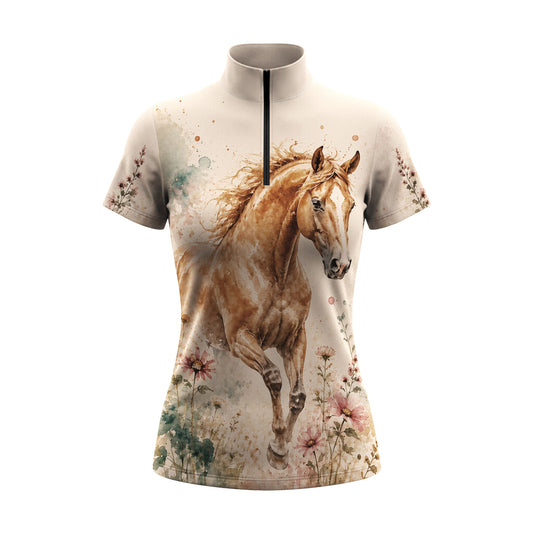 White background studio shot of cream base watercolor golden horse wildflower short sleeve quarter zip riding top