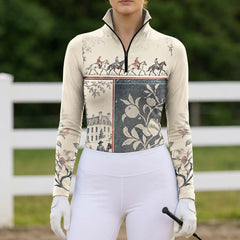 Model wearing the printed riding top with white high waisted breeches and white equestrian gloves