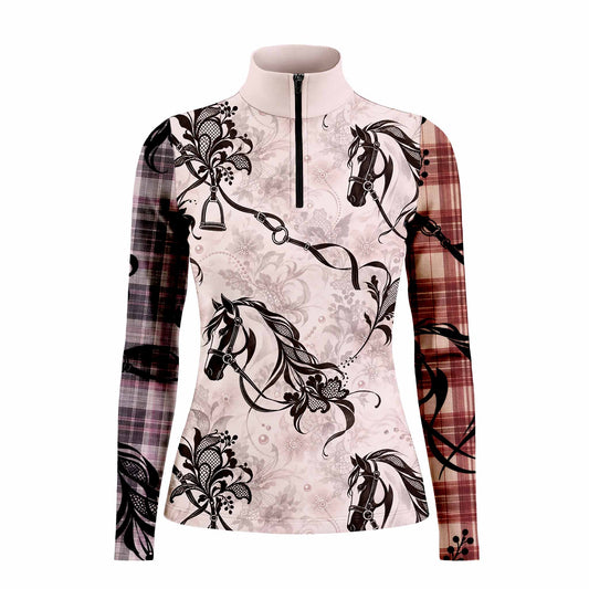 Long sleeve quarter zip riding top in pale pink with black equestrian artwork and contrasting plaid sleeves