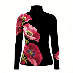 Black long sleeve quarter zip riding top with pink and red poppy floral print on the right side and left forearm
