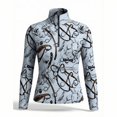 Light blue equestrian tack sketch art print long sleeve zip top, front view slim fit riding top