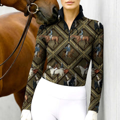 Woman standing with chestnut horse wearing vintage equestrian scene quarter-zip top at stable