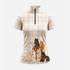 Studio white‑background product mockup of women’s beige‑peach plaid cute cartoon horses & farm puppy dogs front‑print short‑sleeve quarter‑zip riding top
