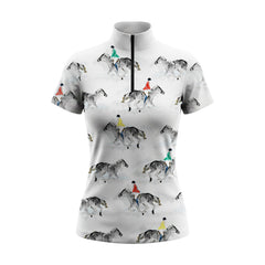 Studio white‑background product mockup of women’s white short‑sleeve quarter‑zip riding top with full all‑over watercolor jumping rider print