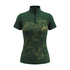 Outdoor equestrian arena model shot of rider in white breeches wearing black short‑sleeve quarter‑zip riding top with gold hunt‑scene artwork