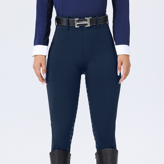 Navy riding pants with a belt on a white background