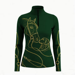 Studio white‑background product mockup of forest‑green long‑sleeve quarter‑zip riding top with gold line‑art horse and retriever dog graphic