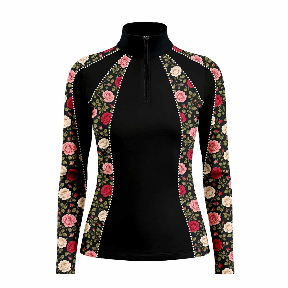 Lifestyle shot outside white stable farmhouse of female rider wearing black vintage rose floral long‑sleeve riding top with rhinestone‑dot panel trim, paired with beige riding breeches