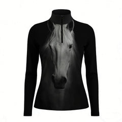 Studio white‑background product mockup of women’s black long‑sleeve quarter‑zip riding top with realistic white horse‑head front portrait print