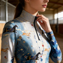 Close-up view of the Art Deco Galloping Horses Print Long-Sleeve Riding Top, highlighting the print details in a stable setting
