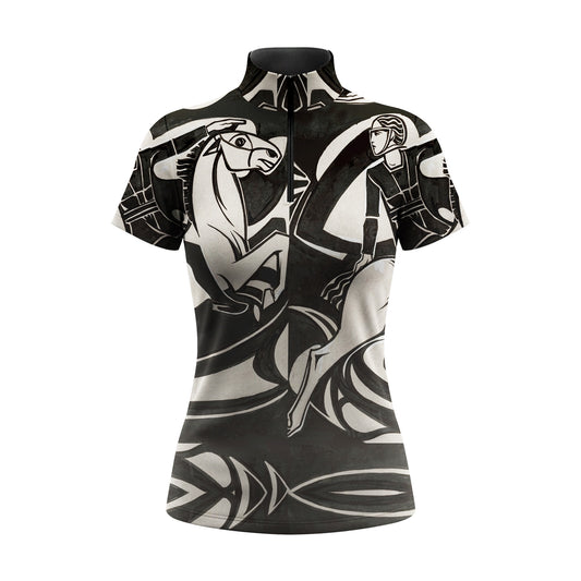 Close-up shot of model adjusting the black half-zip stand collar of the Art Deco monochrome equestrian short sleeve riding top at sunny pasture grounds
