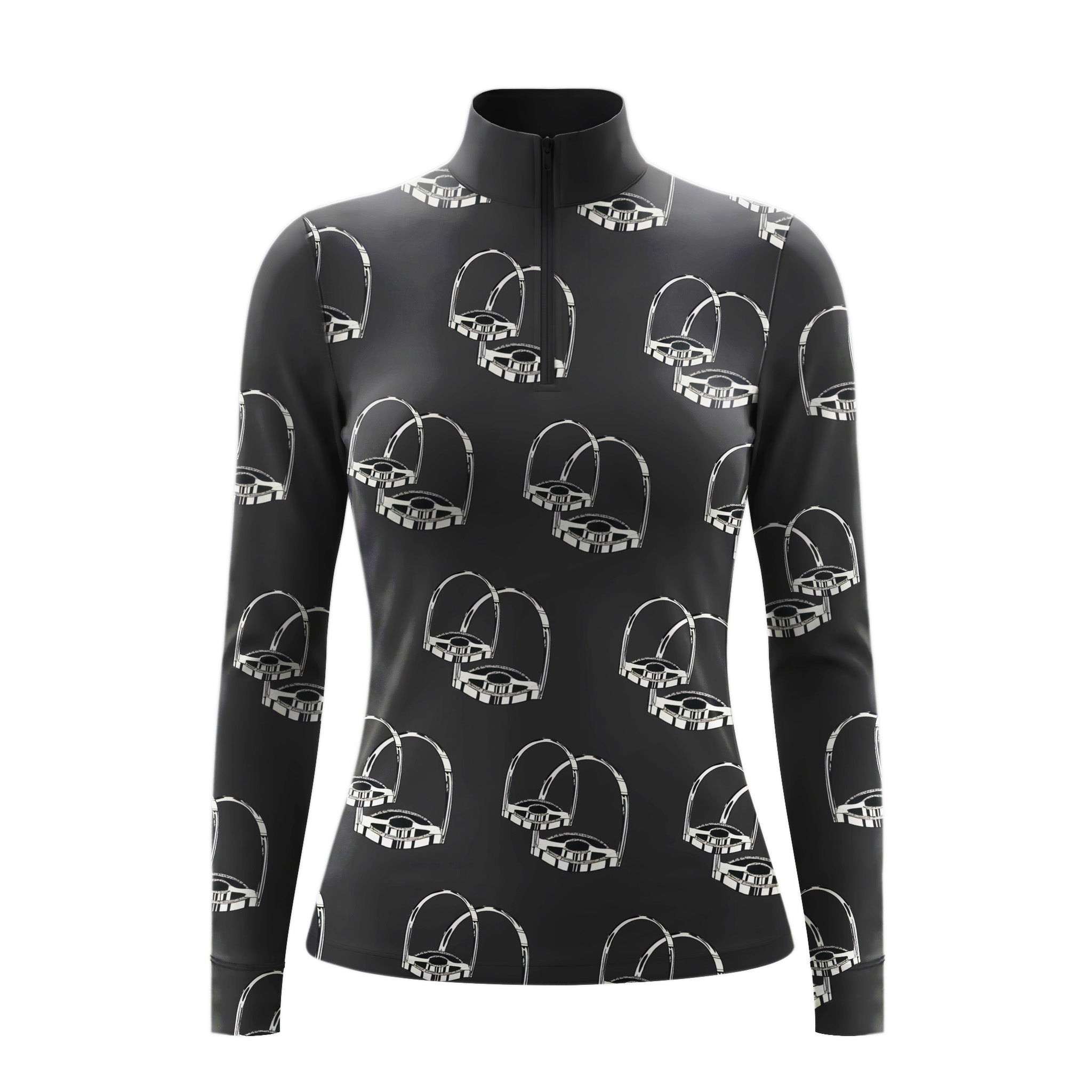 Model standing beside brown horse’s head wearing monochrome sketch stirrup hardware long sleeve riding top against light grey stable wall
