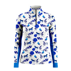 White background studio shot of full allover blue floral horse print riding top with royal blue side panels and cuffs