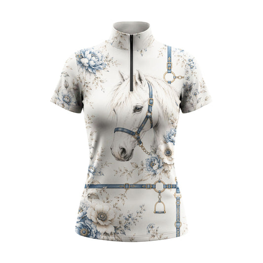 Studio flat view of the Blue Floral Horse Portrait & Tack Print Short-Sleeve Quarter-Zip Riding Top, showcasing the full print details
