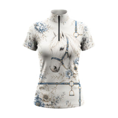 Studio flat view of the Blue Floral Horse Portrait & Tack Print Short-Sleeve Quarter-Zip Riding Top, showcasing the full print details
