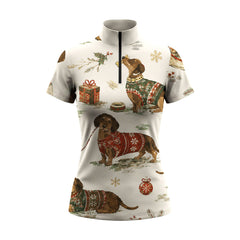 Clean white‑background studio mockup of cream quarter‑zip short‑sleeve riding top with Christmas dachshund holiday all‑over print