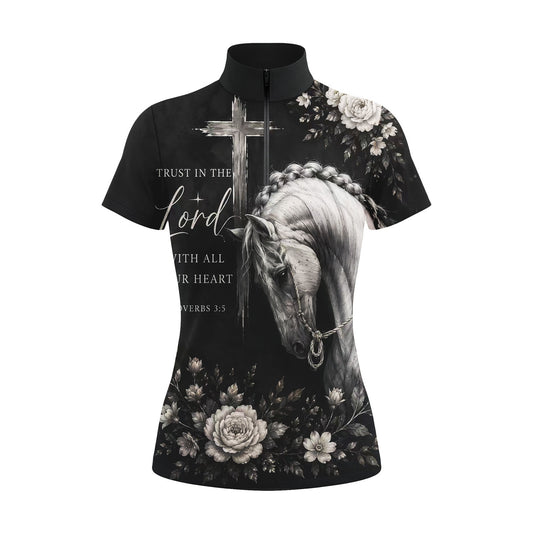 White background studio shot of solid black monochrome faith print braided white horse cross bible verse peony floral allover print short sleeve quarter zip riding top
