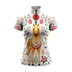 Studio white‑background product mockup of white short‑sleeve quarter‑zip riding top with all‑over folk‑art decorated golden horse and romantic rose floral print