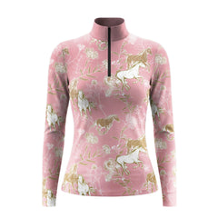 White‑background studio mockup of dusty‑rose‑pink quarter‑zip long‑sleeve riding top with galloping‑horse wild‑floral all‑over print