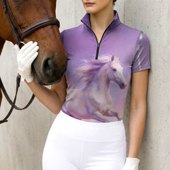Model wearing the Lavender Gradient Horse Portrait Print Short-Sleeve Riding Top at the stable, with a chestnut horse
