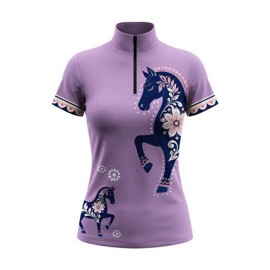 White background studio shot of lilac folk floral horse print short sleeve quarter zip riding top