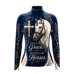 White background studio shot of deep navy full allover Christian cross white horse Saved By Grace gold floral horse bit vintage western print long sleeve quarter zip riding top
