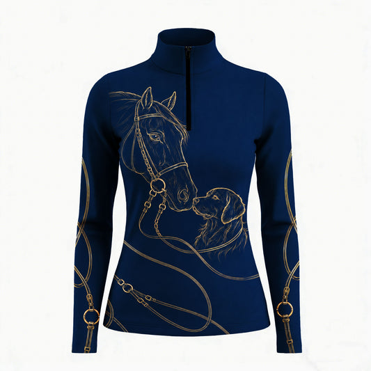 Equestrian show‑jumping arena close‑up model shot of rider wearing navy quarter‑zip riding top with gold horse‑retriever line‑art graphic