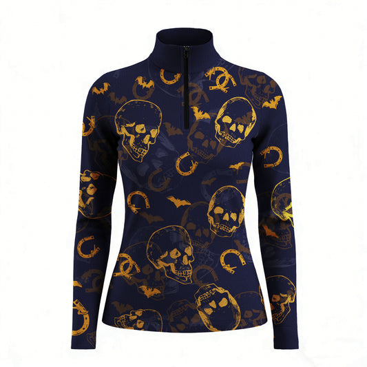 Studio white‑background product mockup of women’s navy long‑sleeve quarter‑zip riding top with full golden skull bat horseshoe all‑over print