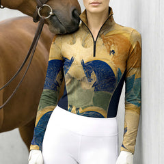 Equestrian showground arena shot of rider in ochre‑gold antique war‑horse fresco print long‑sleeve quarter‑zip riding top