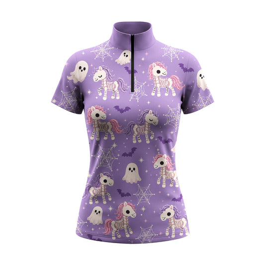 Studio white‑background product mockup of women’s lavender‑purple short‑sleeve quarter‑zip riding top with full cute skeleton unicorn Halloween all‑over print