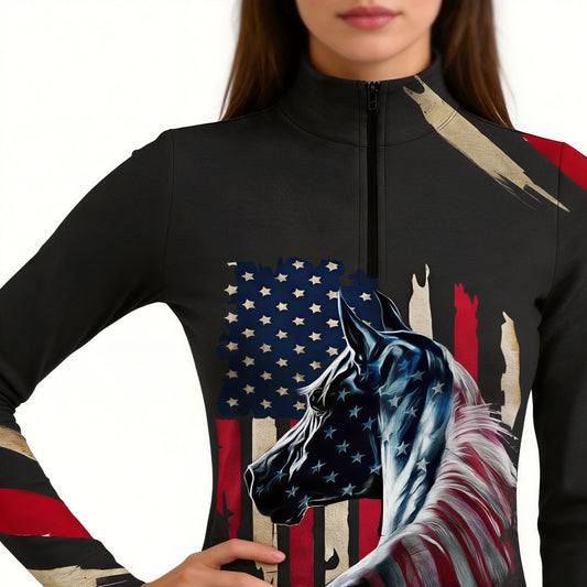Woman wearing RIDER ATELIER black American flag horse quarter-zip top, closeup view