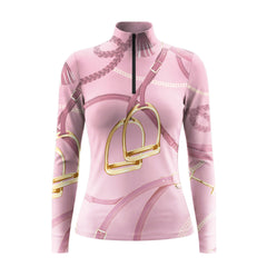 Studio flat view of the RIDER ATELIER Blush Pink Equestrian Tack Print Long-Sleeve Quarter-Zip Riding Top, showcasing the full tack print and quarter-zip collar
