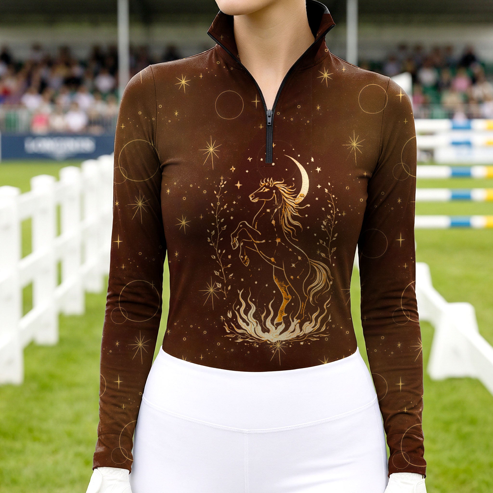 Woman wearing RIDER ATELIER celestial horse quarter-zip top at the show jumping arena