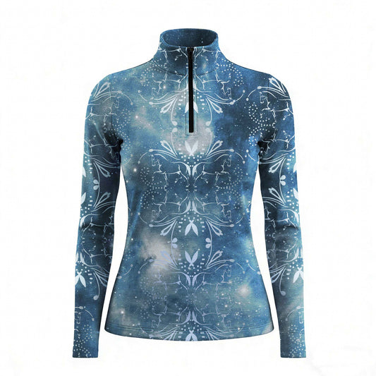 Woman wearing RIDER ATELIER celestial quarter-zip top with a chestnut horse