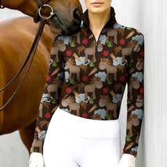 Woman wearing RIDER ATELIER cute cartoon horse dark brown quarter-zip top with a chestnut horse
