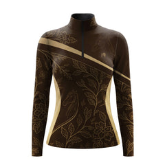 Studio shot of the RIDER ATELIER Brown Floral Horse Sketch Print Long-Sleeve Quarter-Zip Riding Top, showing the full print, rich chocolate brown base, contrast side panels, quarter-zip collar, and fabric texture against a clean white background
