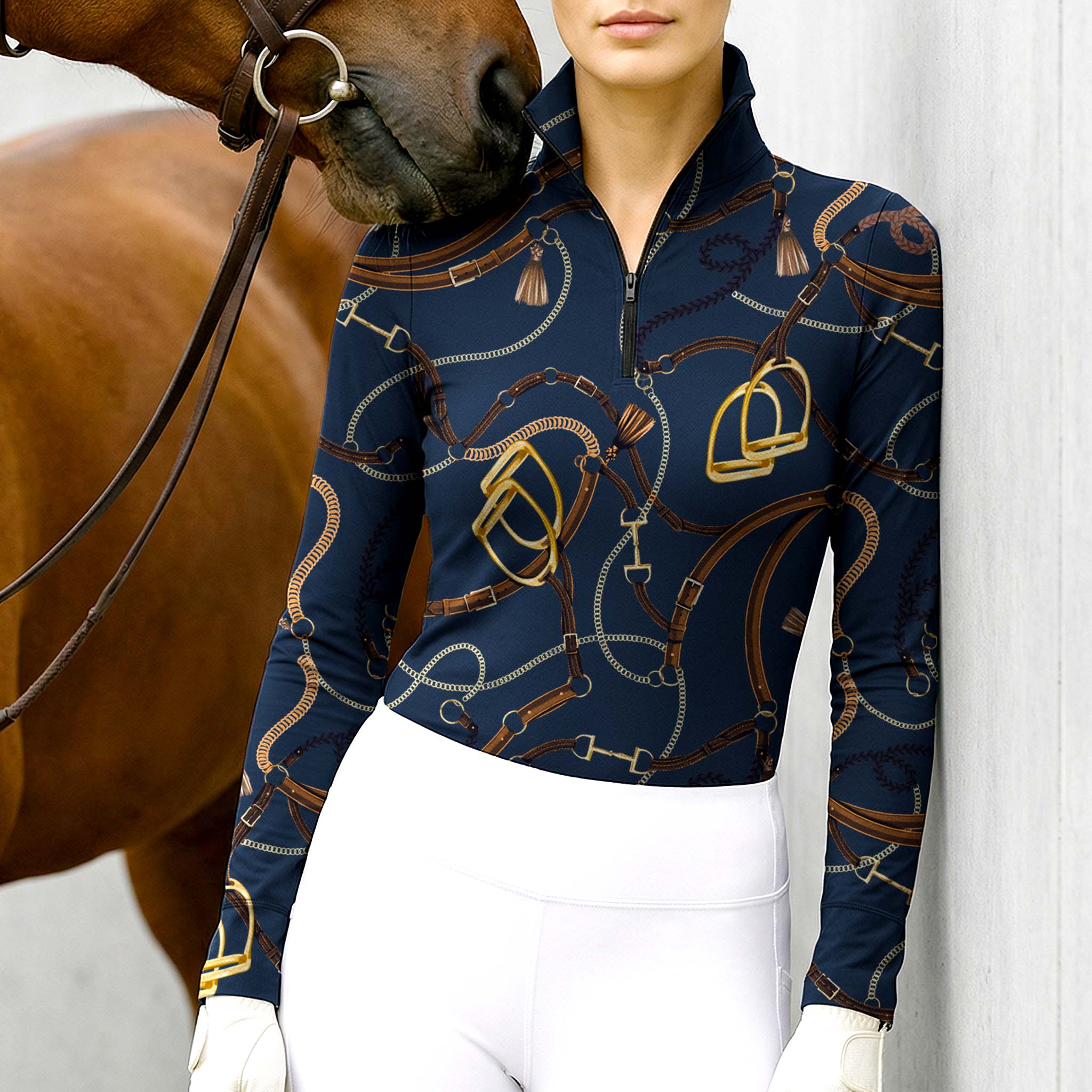 Woman wearing RIDER ATELIER luxury tack quarter-zip top with a chestnut horse
