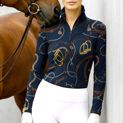 Woman wearing RIDER ATELIER luxury tack quarter-zip top with a chestnut horse
