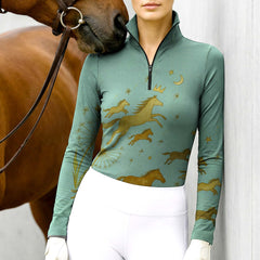 Woman wearing RIDER ATELIER magical horse forest quarter-zip top with a chestnut horse