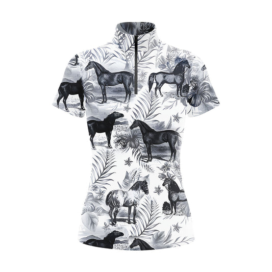 Studio flat view of the RIDER ATELIER Monochrome Tropical Horse Print Short-Sleeve Quarter-Zip Riding Top, showcasing the full high-contrast print and quarter-zip collar
