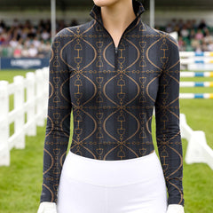 Woman wearing RIDER ATELIER snaffle bit lattice charcoal quarter-zip top at the show jumping arena