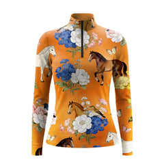 Studio flat view of the RIDER ATELIER Tangerine Horse & Botanical Print Long-Sleeve Quarter-Zip Riding Top, showcasing the full whimsical print
