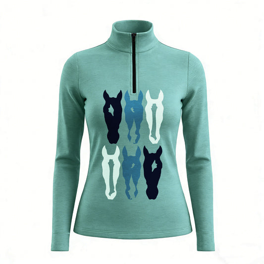 RIDER ATELIER teal stacked horse silhouette quarter-zip top on white background, front view
