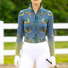 Woman wearing RIDER ATELIER vintage show jumping teal quarter-zip top at the outdoor pasture